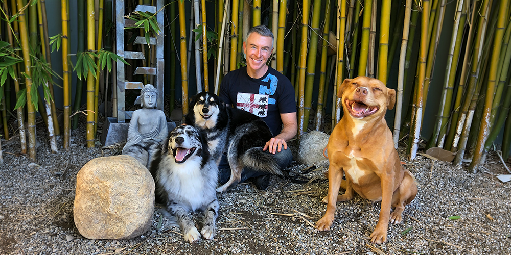 Michael R Burke with his dogs