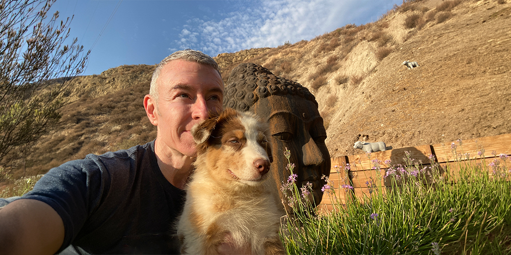 Pet meditation with Michael R Burke showing dog relaxing during meditation session