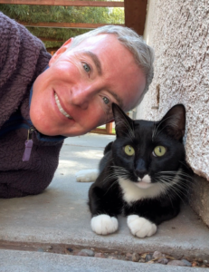 Michael R Burke with his cat