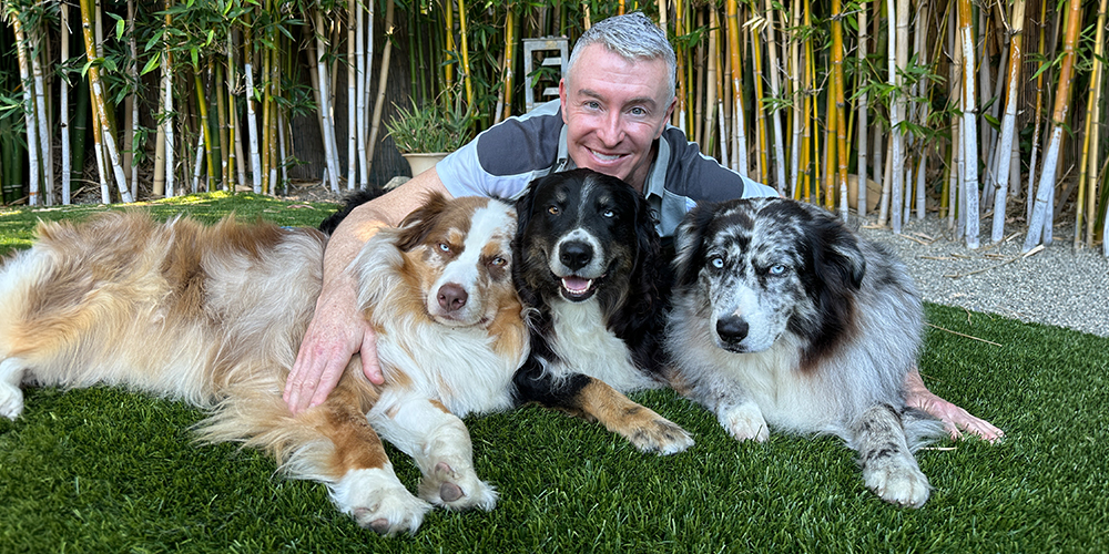 Michael Burke animal communicator with dogs